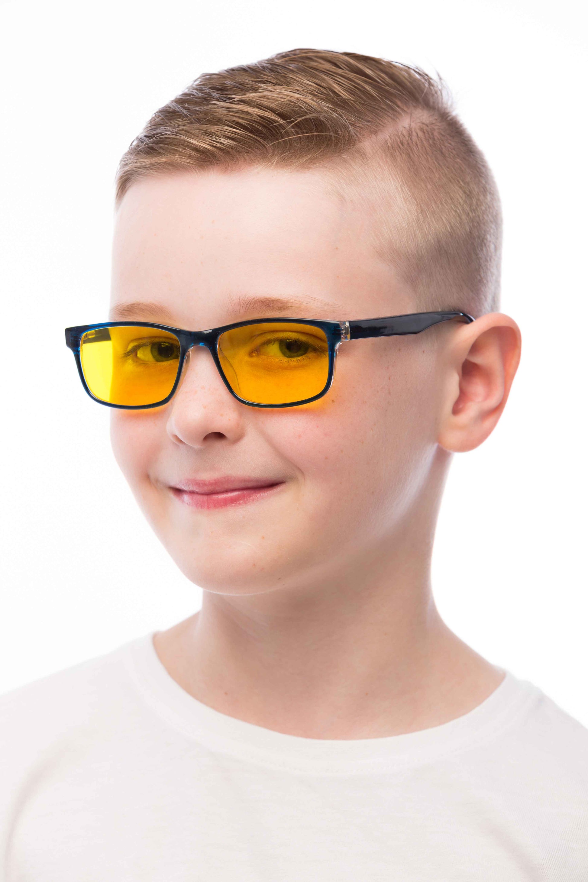 Boy Wearing Theo Light Sensitivity Glasses, Angle view